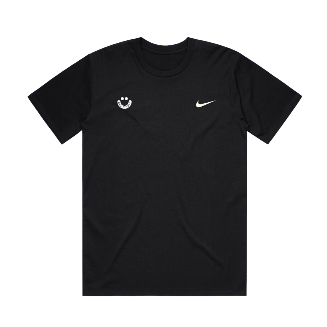 Front of a black t-shirt, left hand breast area shows white ability fest smiley logo and right hand side shows white nike swoosh.